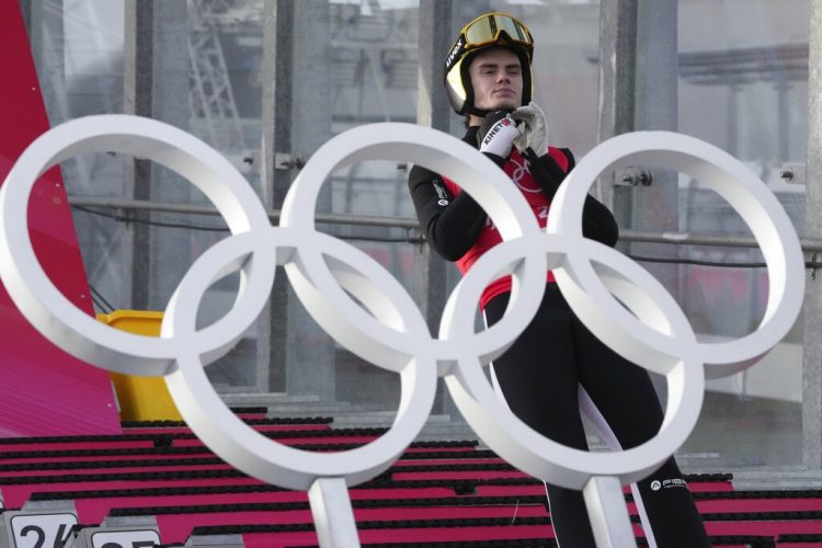 Olympic ski jumpers count on technique and timing